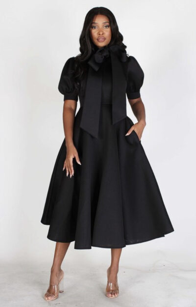 "Miss Character" Black Petite Short Bubble Sleeve, Neck Bow Fit And Flair Midi Dress With Pockets And Back Zipper